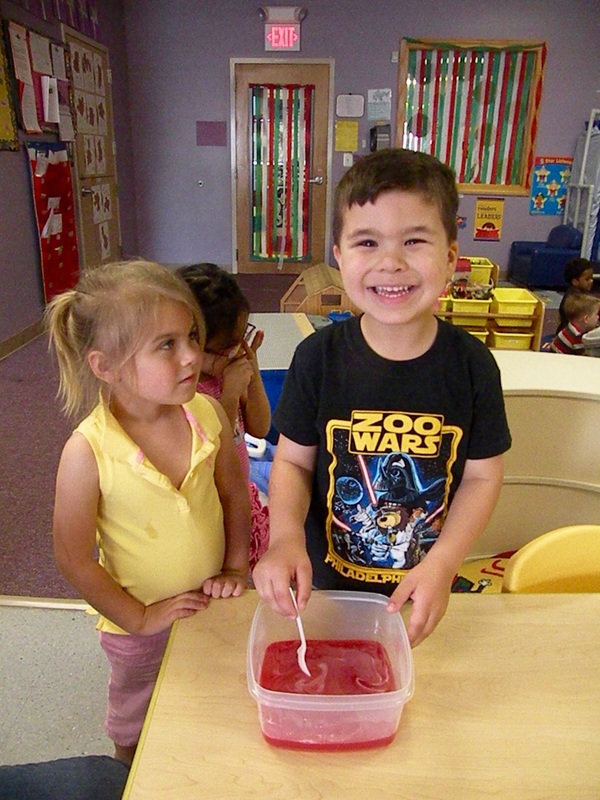 Pre-schoolers mixing jello
